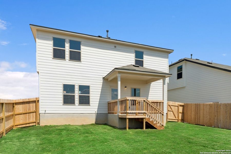 Front exterior of a new home in Mesquite Ridge, San Antonio, TX, highlighting curb appeal (Image 19). Front exterior of a new home in Mesquite Ridge, San Antonio, TX, highlighting curb appeal (Image 19).
