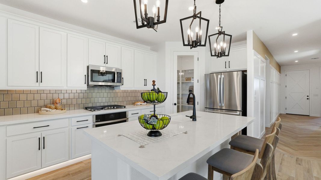 Representative furnished interior of a home built from the Bluebell by DRB Homes in Apache Farms, Buckeye (Image 10).
