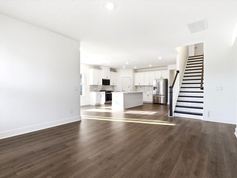 Spacious, unfurnished interior of a new home in The Coves at Lakes of Cane Bay, Summerville (Image 15).