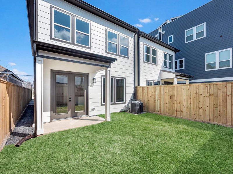 Exterior details and patio area of a home in , Houston (Image 3).
