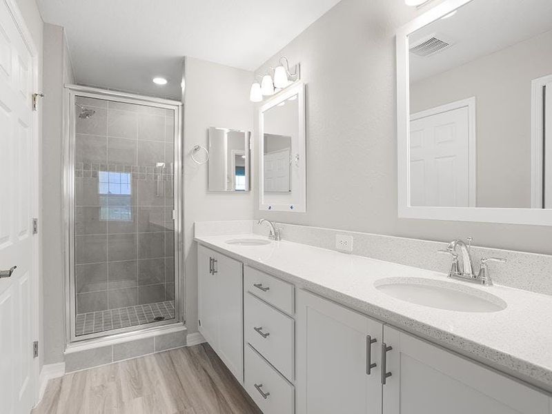 Your suite is complete with a private en-suite bath - Capri bungalow by Highland Homes Your suite is complete with a private en-suite bath - Capri bungalow by Highland Homes