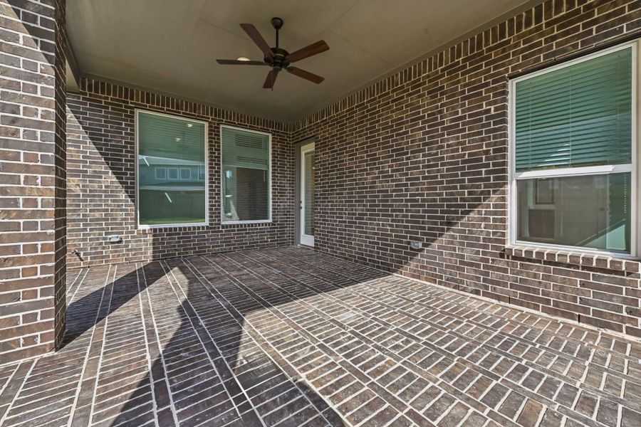 Exterior details and patio area of a home in Artavia, Conroe (Image 4).