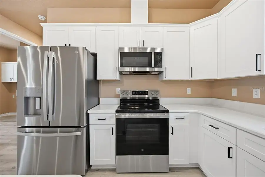 Furnished interior view inside a new home in , Ocala (Image 7).