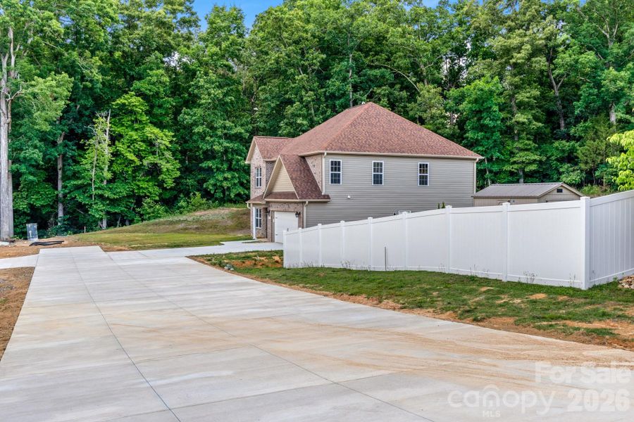 Front exterior of a new home in , Winston-Salem, NC, highlighting curb appeal (Image 24).