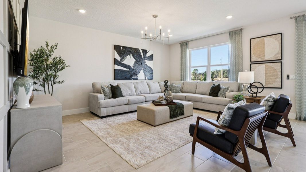 The Mangrove Model Living Area at Lakeside at Satilla by DRB Homes in Saint Cloud, FL