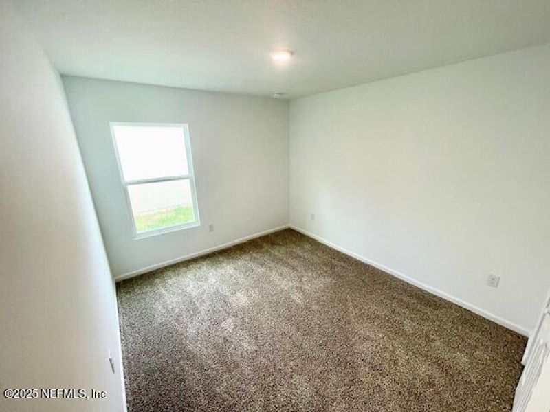 Spacious, unfurnished interior of a new home in Grand Reserve, Bunnell (Image 54).