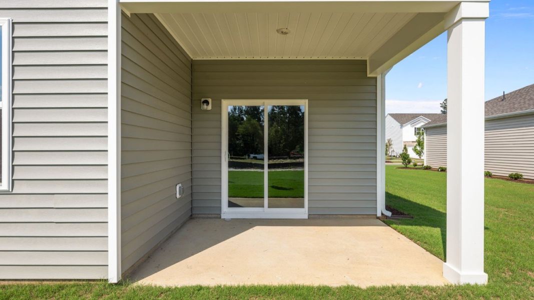 Front exterior of a new home in West New Bern, New Bern, NC, highlighting curb appeal (Image 16).