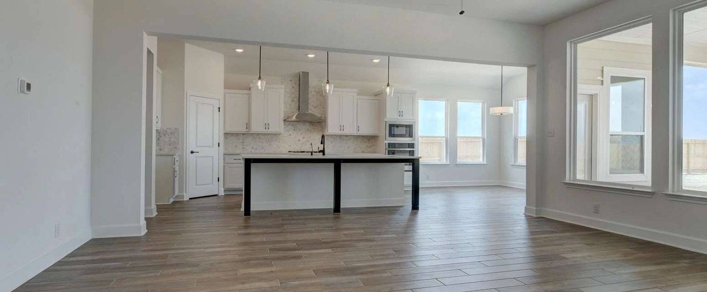 Representative furnished interior of a home built from the Ellington by Ashton Woods in Megan's Landing 70's, Castroville (Image 3).