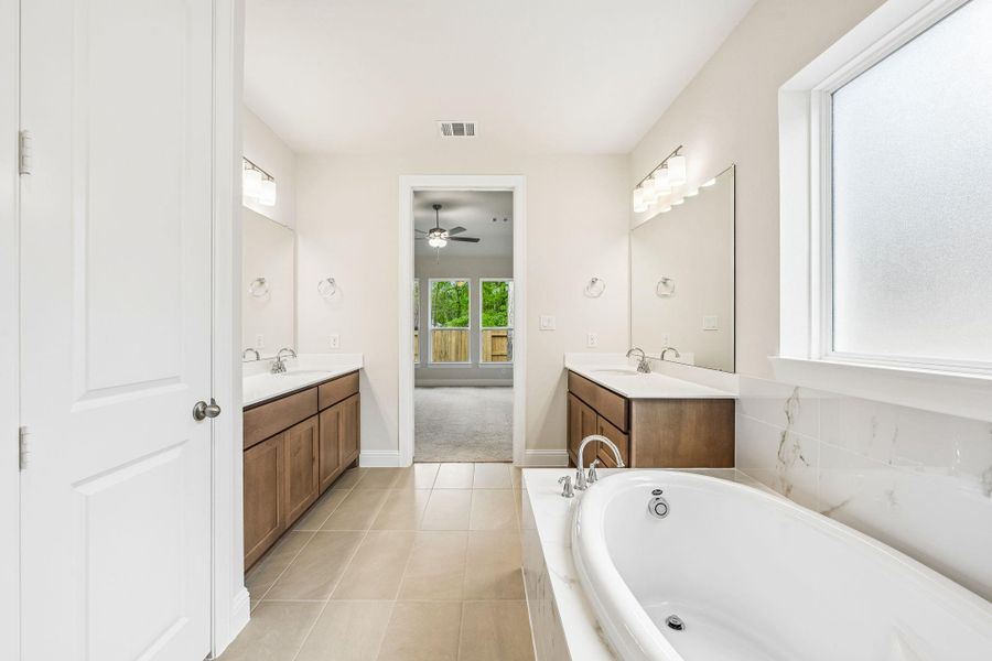 Furnished interior view inside a new home in Woodhavyn 50', Magnolia (Image 10).