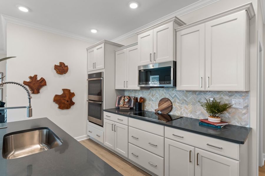 Representative furnished interior of a home built from the The Hibiscus by Chesapeake Homes in Coastal Club of the Carolinas, Calabash (Image 12).