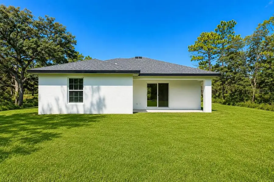 Exterior details and patio area of a home in , Brooksville (Image 3). Exterior details and patio area of a home in , Brooksville (Image 3).