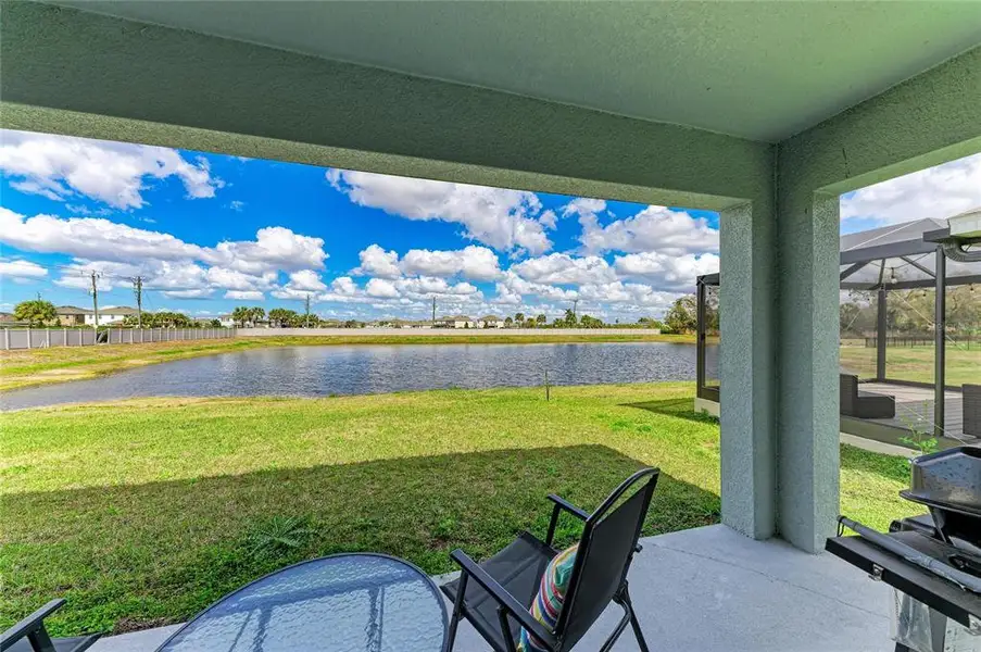 Exterior details and patio area of a home in Evergreen, Bradenton (Image 4).