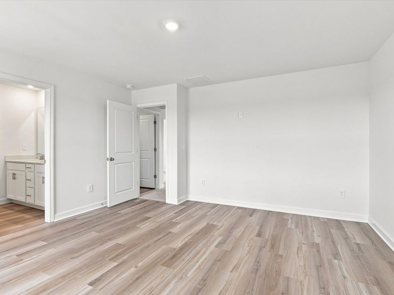 Spacious, unfurnished interior of a new home in Waterside - Boardwalk Series, Longs (Image 13).