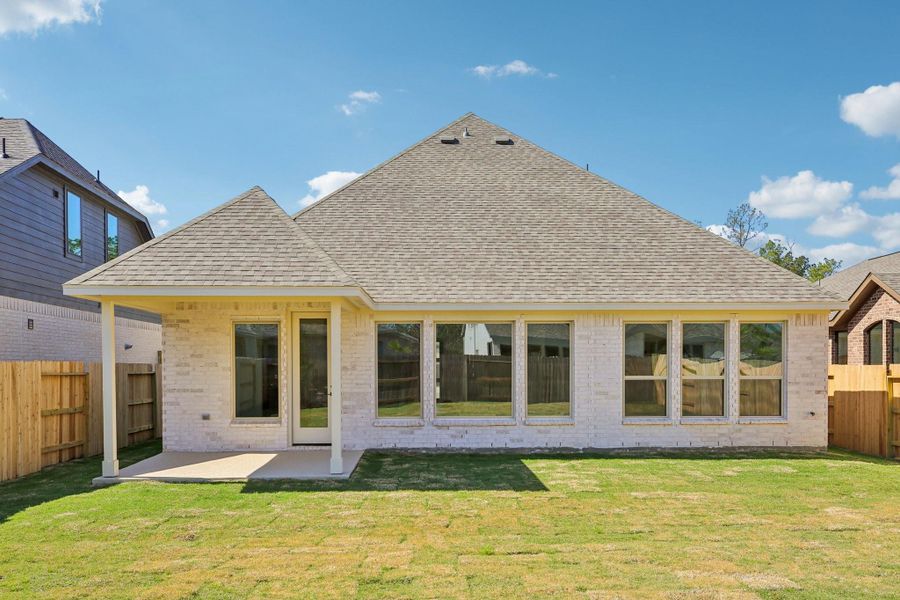 Exterior details and patio area of a home in Evergreen 50', Conroe (Image 22).