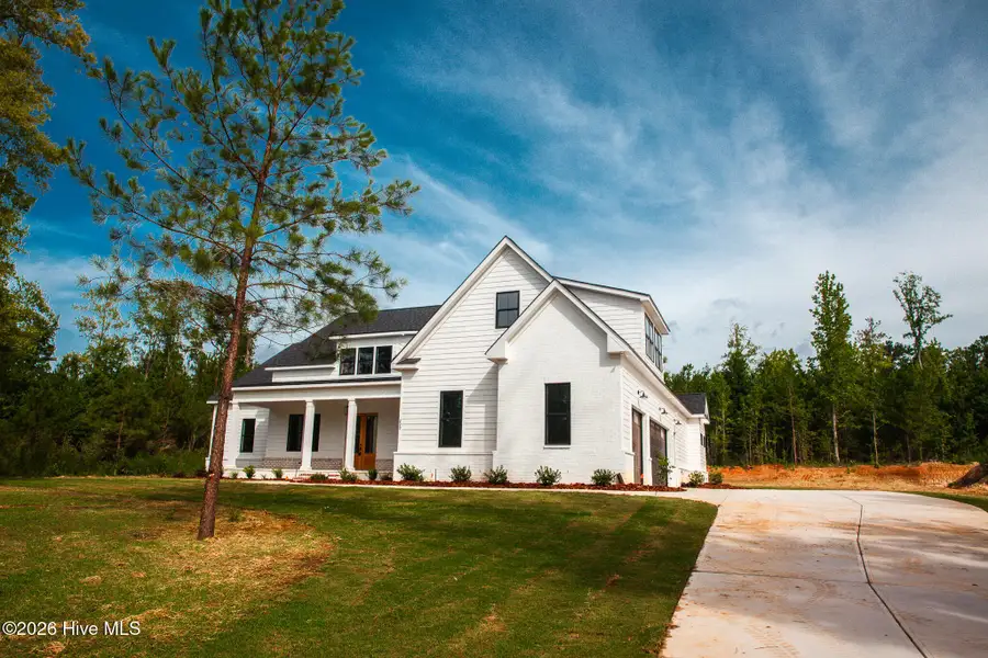 Front exterior of a new home in Marshall Mills, Grovetown, GA, highlighting curb appeal (Image 2). Front exterior of a new home in Marshall Mills, Grovetown, GA, highlighting curb appeal (Image 2).