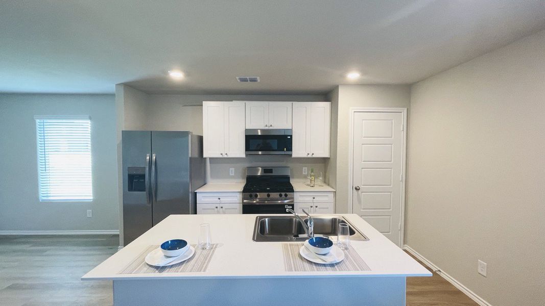 Furnished interior view inside a new home in Sunnycreek, Crowley (Image 5).