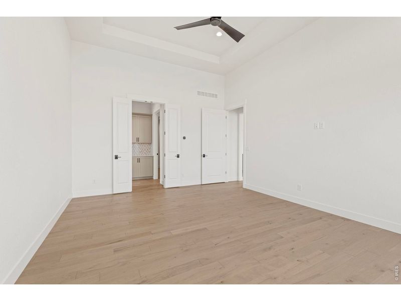Spacious, unfurnished interior of a new home in RainDance, Windsor (Image 35).