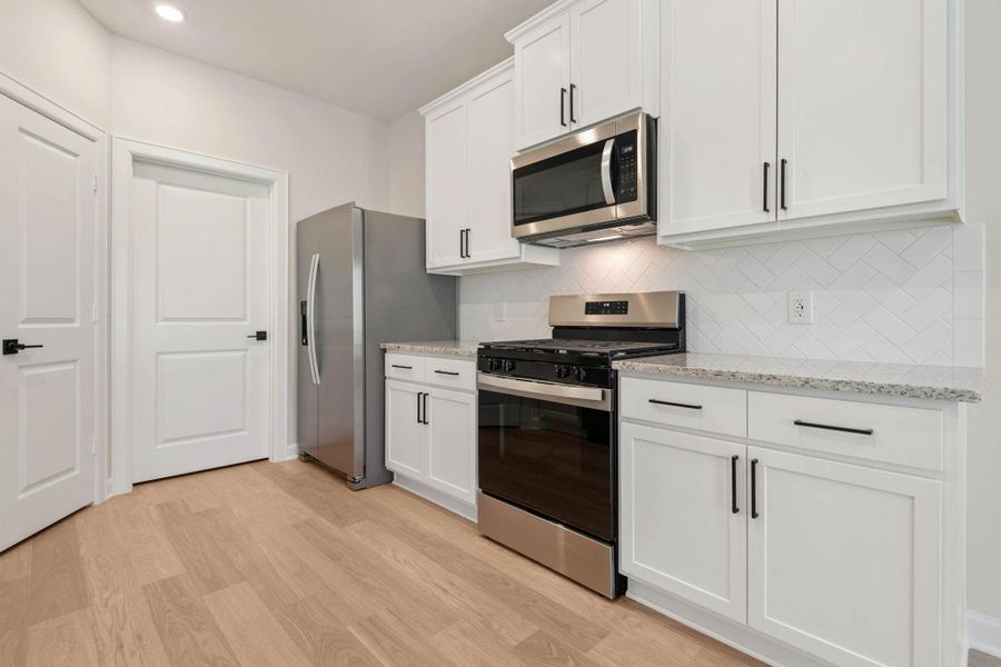 Furnished interior view inside a new home in Magnolia Woods, Magnolia (Image 3). Furnished interior view inside a new home in Magnolia Woods, Magnolia (Image 3).