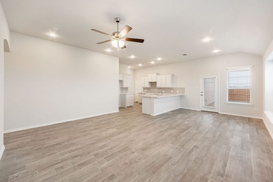 Representative exterior photo of a completed home built from the Joliet by Impression Homes in Heartland, Heartland, TX (Image 12).