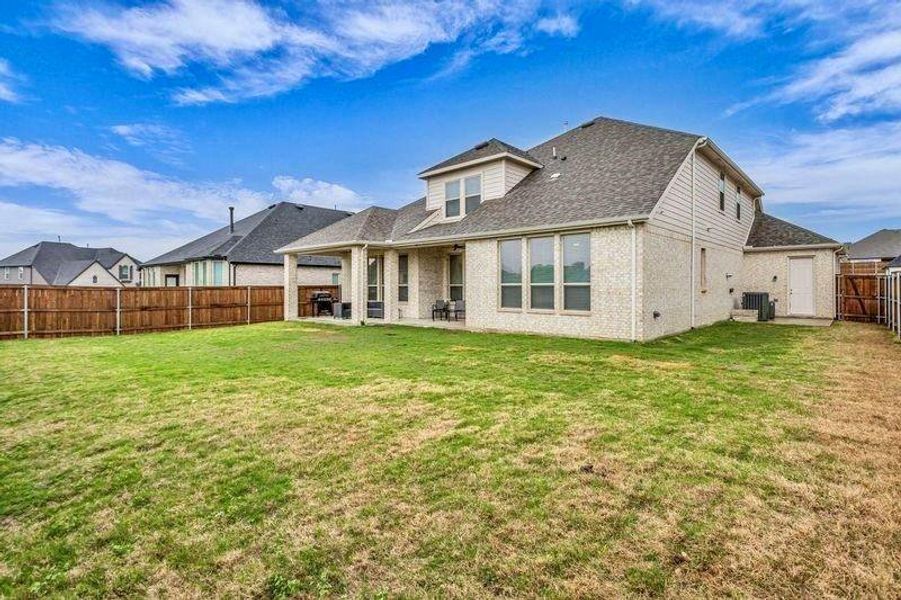 Exterior details and patio area of a home in , Fate (Image 3).