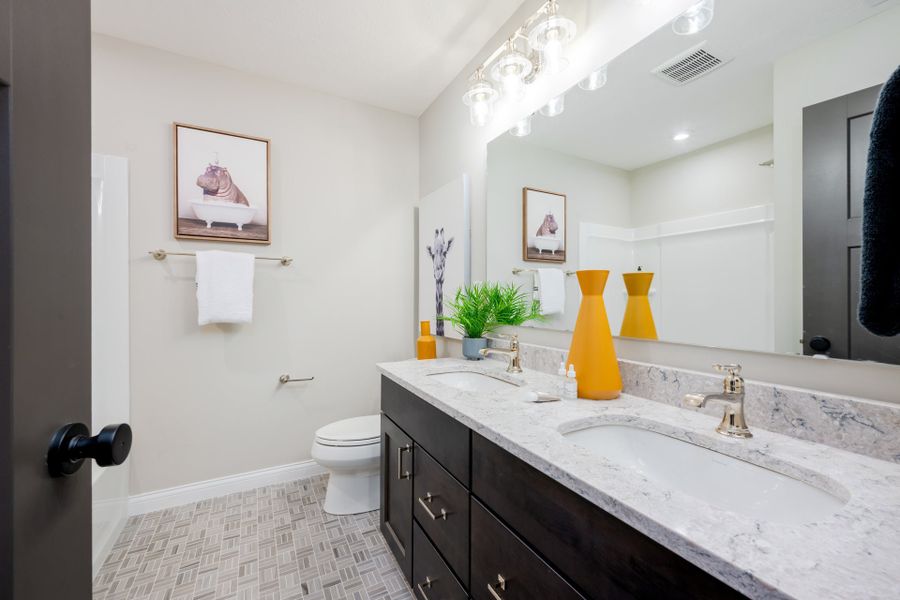 Representative furnished interior of a home built from the Charles by Fischer Homes in Twin Lakes, Hoschton (Image 50).
