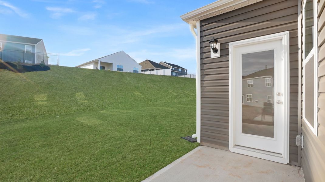 Exterior details and patio area of a home in Hunters Ridge, Woodruff (Image 3).