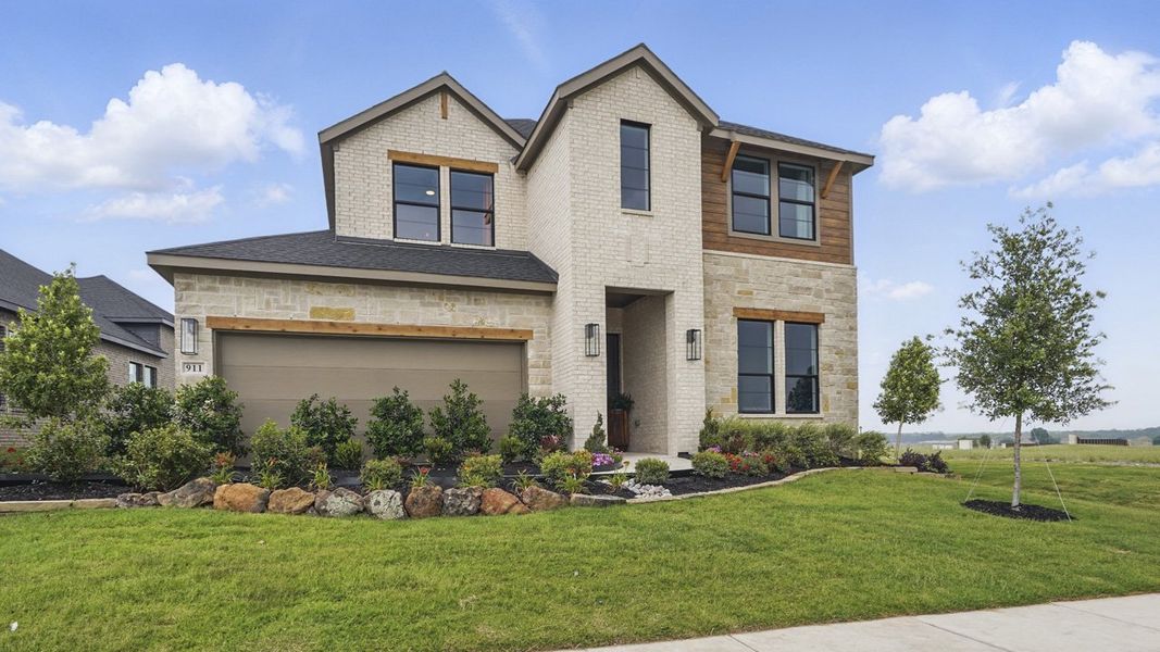 Representative exterior photo of a completed home built from the CYPRESS by D.R. Horton in Clearview Ranch, Royse City, TX (Image 2). Representative exterior photo of a completed home built from the CYPRESS by D.R. Horton in Clearview Ranch, Royse City, TX (Image 2).