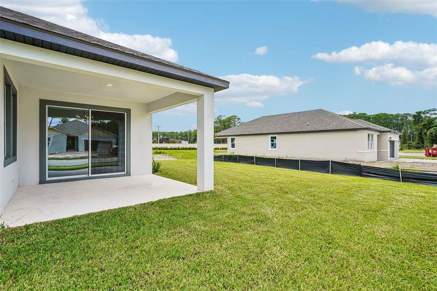Exterior details and patio area of a home in Legends Preserve - Signature Series, Daytona Beach (Image 3).