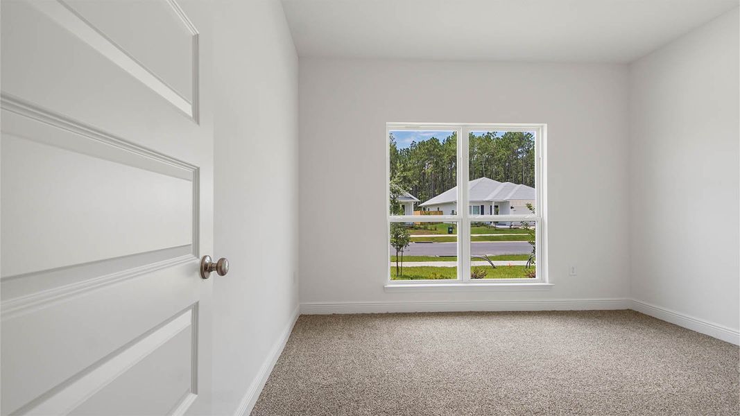 Representative unfurnished interior of a home built from the Kennedy by D.R. Horton in Bayside at Ward Creek, Panama City Beach (Image 34).