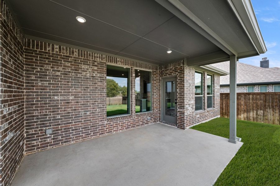 Exterior details and patio area of a home in Silo Mills, Joshua (Image 3).