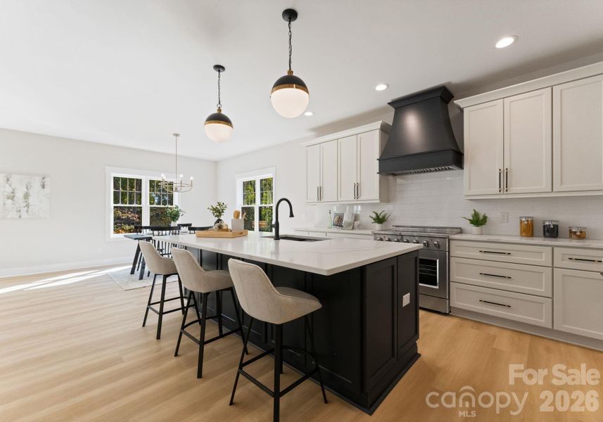 Gourmet Kitchen with Large Island & Stainless Steel Appliances