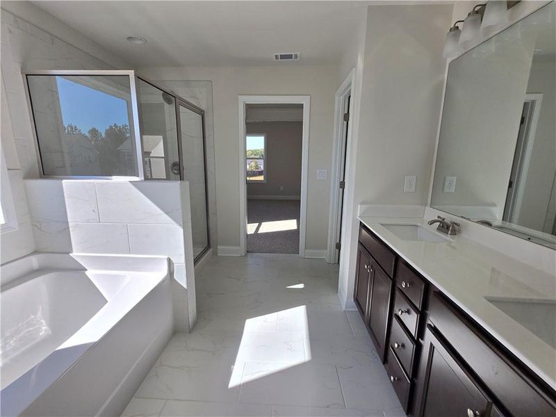 Furnished interior view inside a new home in Enclave at Logan Point, Loganville (Image 7).