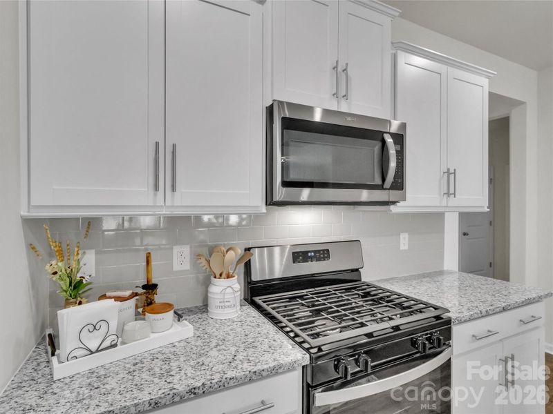 Furnished interior view inside a new home in , Waynesville (Image 16).