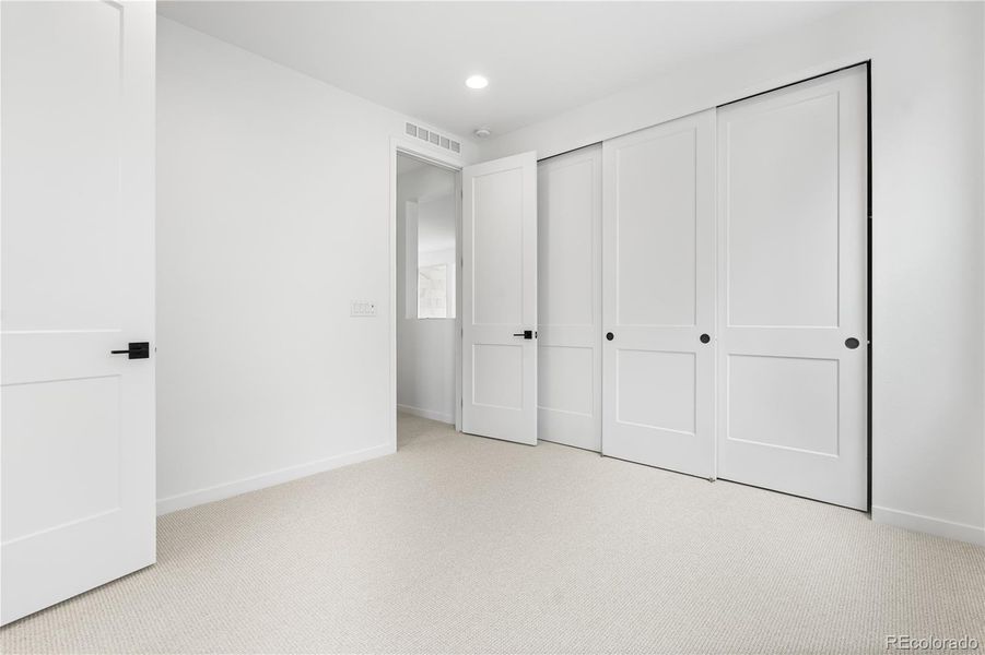 Spacious, unfurnished interior of a new home in Stargaze at Solstice, Littleton (Image 37).