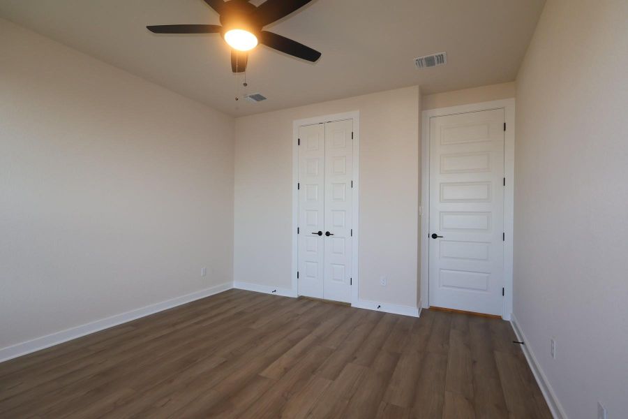Spacious, unfurnished interior of a new home in Heritage, Dripping Springs (Image 14).