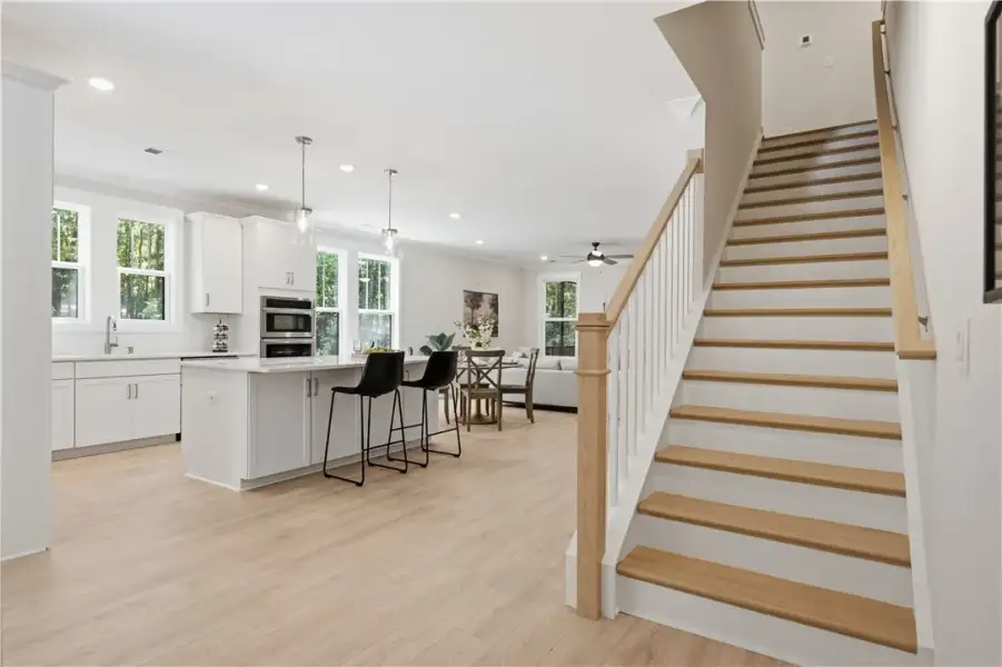 An open floorplan seamlessly connects the light-fi