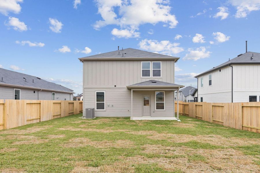 Exterior details and patio area of a home in Montgomery Bend, Montgomery (Image 3).
