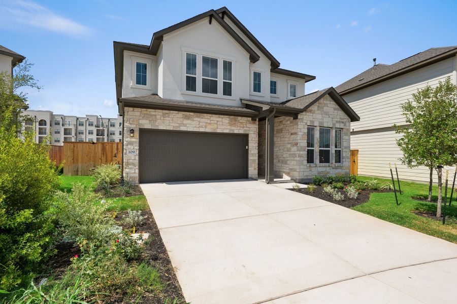 Front exterior of a new home in Park Central, Georgetown, TX, highlighting curb appeal (Image 25). Front exterior of a new home in Park Central, Georgetown, TX, highlighting curb appeal (Image 25).