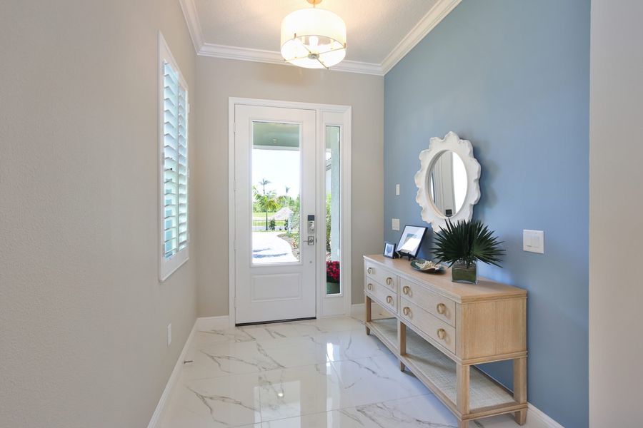 Furnished interior view inside a new home in Boca Royale Golf & Country Club at Wellen Park, Englewood (Image 6).