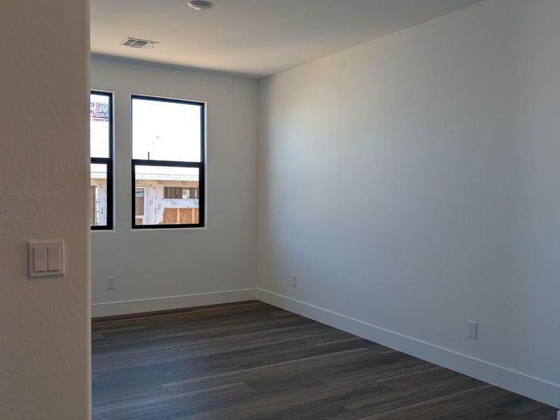 Spacious, unfurnished interior of a new home in South Ranch Western Collection, Prescott (Image 16).