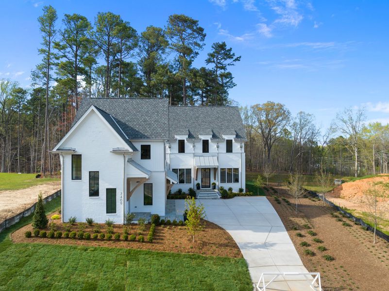 Representative exterior photo of a completed home built from the Eloise by Homes by Dickerson in The Founding at Blue Ridge, Raleigh, NC (Image 26). Representative exterior photo of a completed home built from the Eloise by Homes by Dickerson in The Founding at Blue Ridge, Raleigh, NC (Image 26).