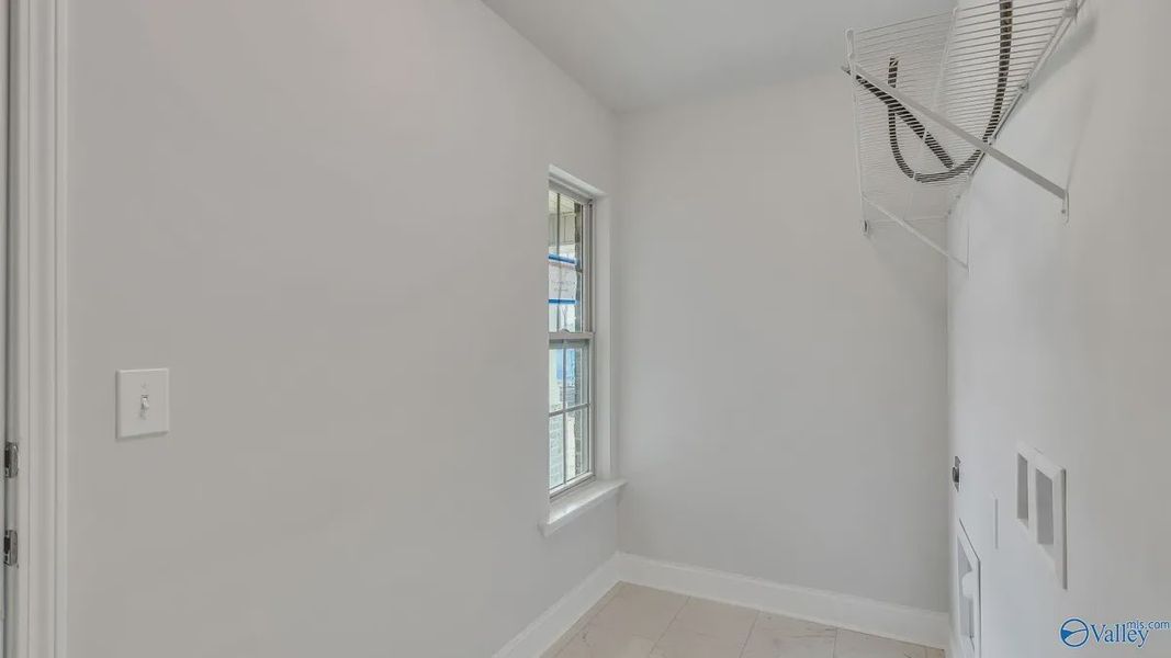 Representative unfurnished interior of a home built from the 1434 by Adams Homes in The Grove at Ballard Park, Jacksonville (Image 22).
