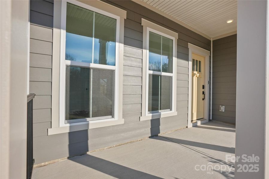 Exterior details and patio area of a home in Forest Creek, Waxhaw (Image 24).