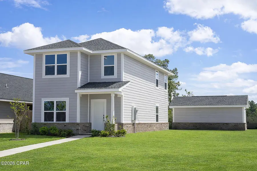 Front exterior of a new home in East Bay, Panama City, FL, highlighting curb appeal (Image 2). Front exterior of a new home in East Bay, Panama City, FL, highlighting curb appeal (Image 2).