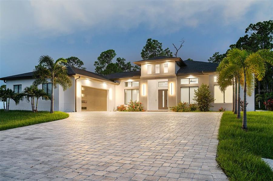 Front exterior of a new home in , North Port, FL, highlighting curb appeal (Image 24).