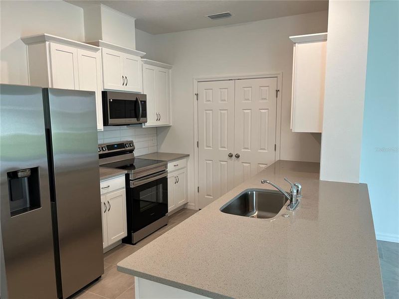 Furnished interior view inside a new home in Marion Ridge, Haines City (Image 7).