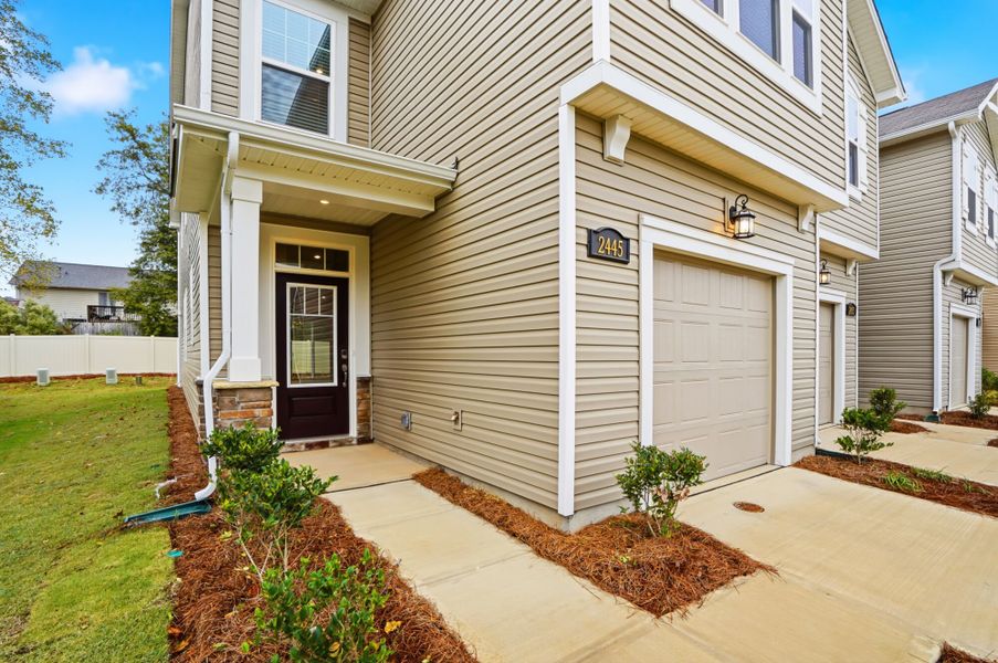 Exterior details and patio area of a home in Hedgecliff Townes, Kannapolis (Image 3). Exterior details and patio area of a home in Hedgecliff Townes, Kannapolis (Image 3).