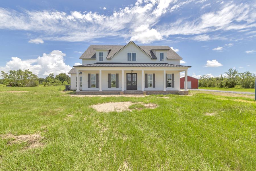 Representative exterior photo of a completed home built from the The Evangeline by Manuel Builders in Chapel Bend, Montgomery, TX (Image 15). Representative exterior photo of a completed home built from the The Evangeline by Manuel Builders in Chapel Bend, Montgomery, TX (Image 15).