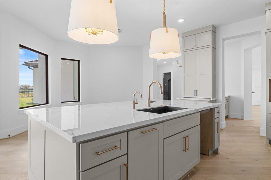 Enjoy seamless flow from the kitchen island to the breakfast area. Enjoy seamless flow from the kitchen island to the breakfast area.