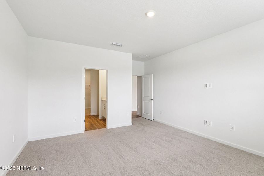 Spacious, unfurnished interior of a new home in Lakes at Bella Lago - Signature Series, Green Cove Springs (Image 14).